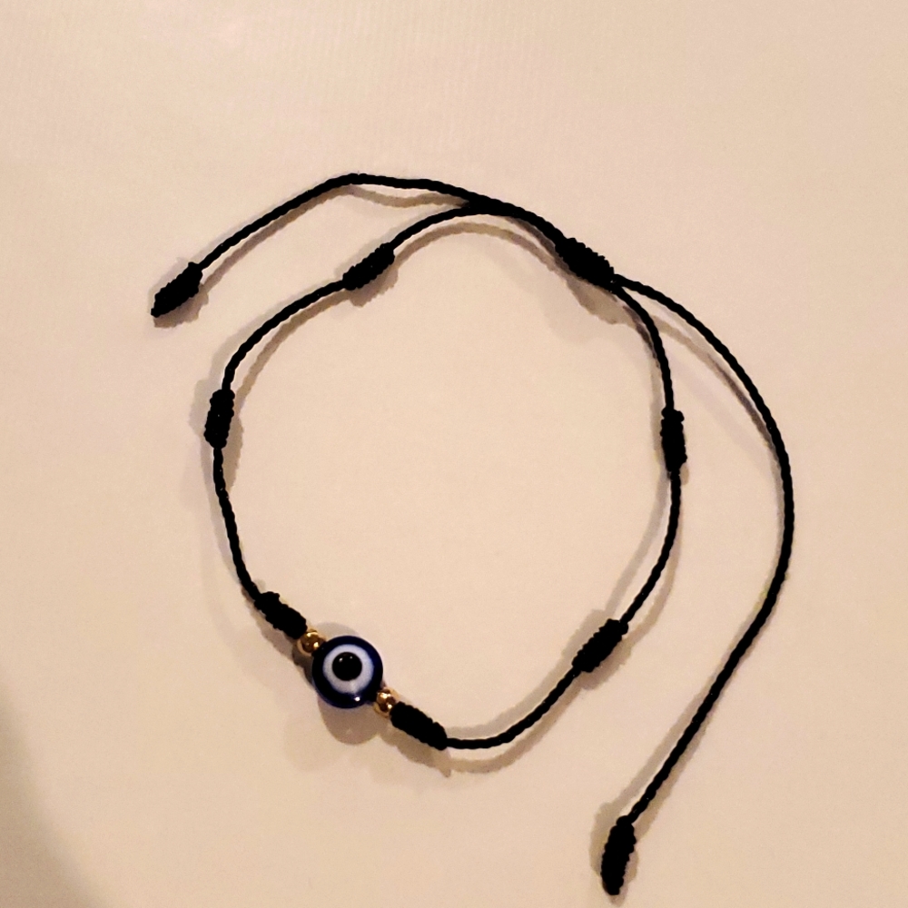 Evil eye bracelet with black string
